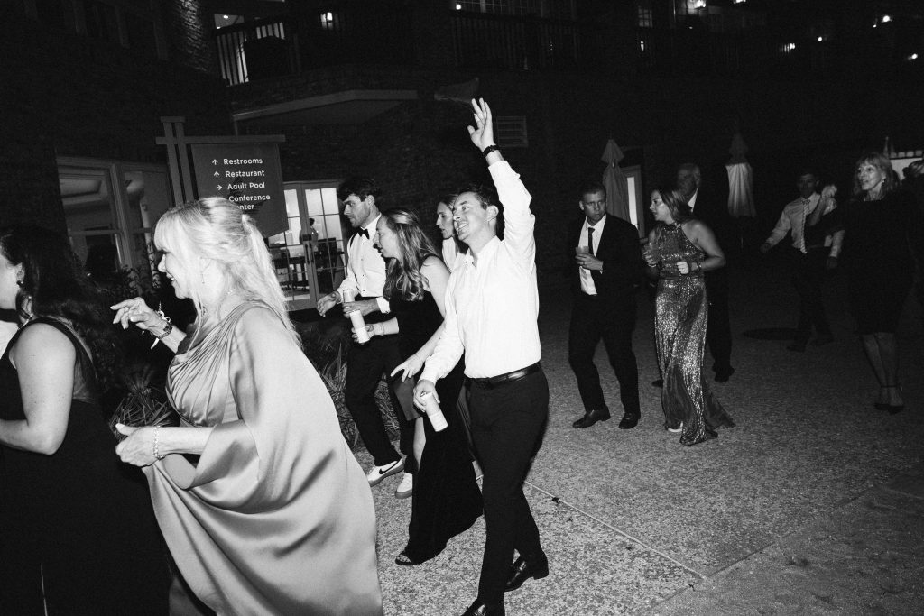 guests celebrate during a second line