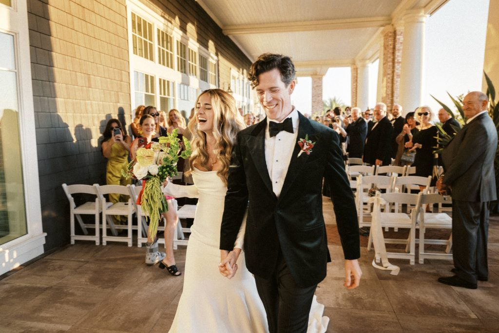 bride and groom celebrate after their wedding ceremony