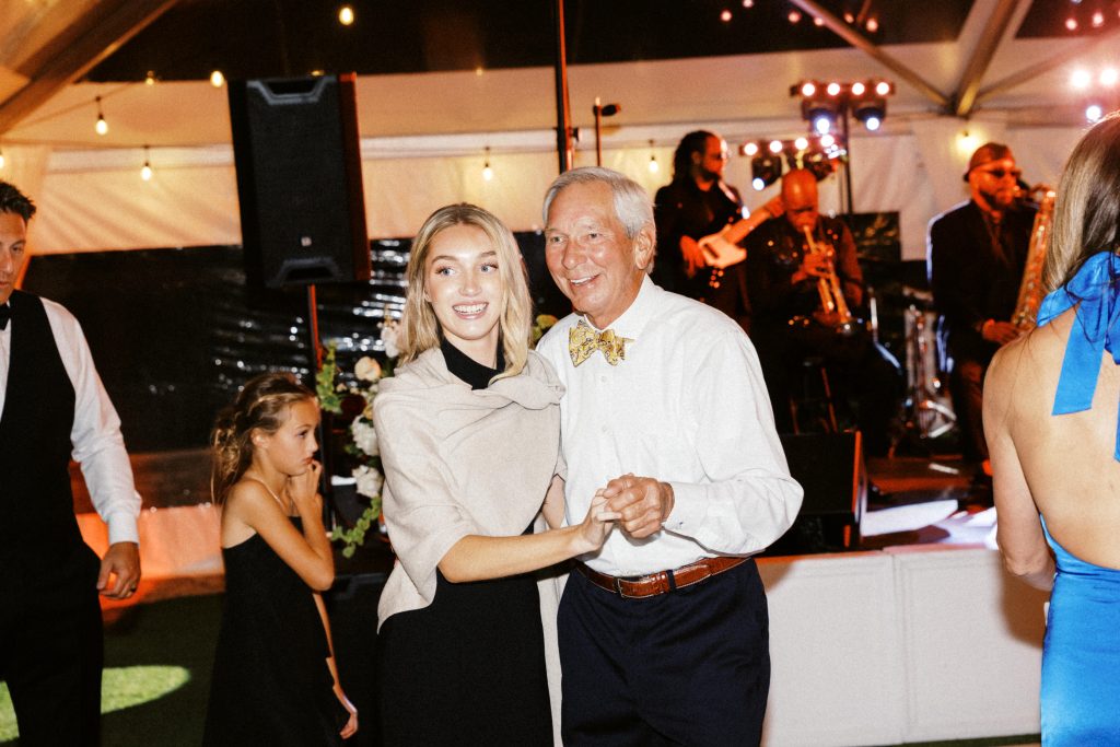 wedding guests dance at reception
